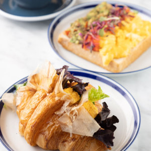 suit coffee sake croissant